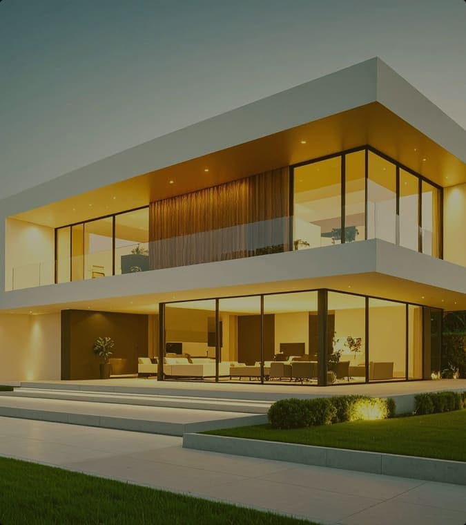 Modern two-storey home built by Blibo, glass frontage lit at dusk